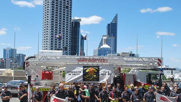 More than 100 firefighters rallied at parliament house today calling for laws to provide compensation to career firefighters who develop cancer.