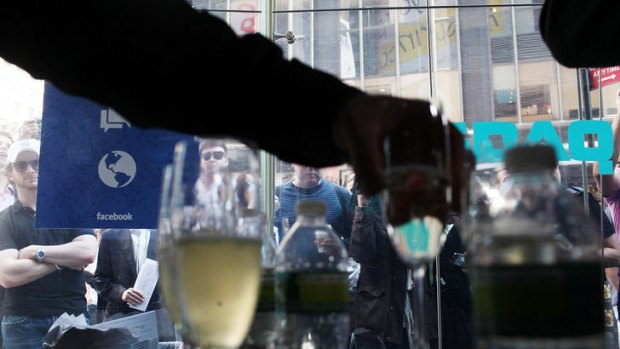 Champagne is passed out for executives moments before Facebook shares go public.