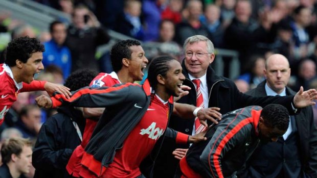 Winners ... Alex Ferguson's "lads are a celebration of footballing virtues."