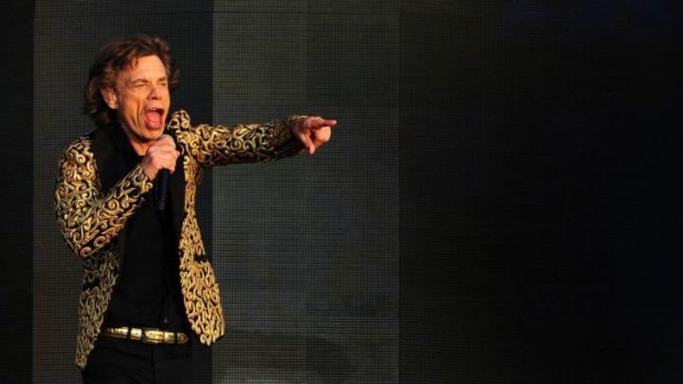 You've got to move like great-grandpa ... Mick Jagger performs with the Rolling Stones during the British Summertime Hyde Park concert in London on July 13, 2013.