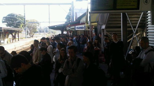 Delays ... passengers at Rockdale station this morning.