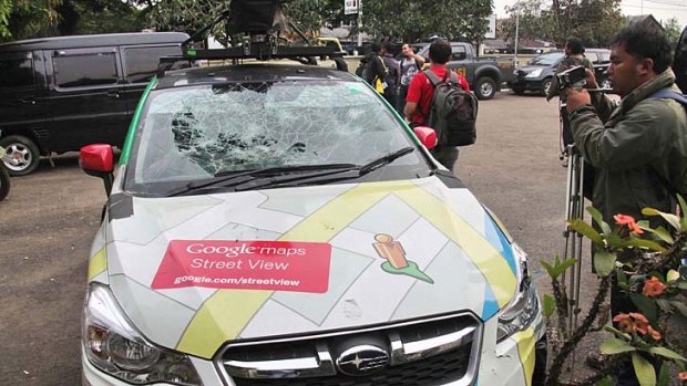 Crash and run: A driver collecting video data for internet giant Google's Street View feature in Indonesia slammed into two vehicles after trying to flee responsibility for an earlier crash, police said.