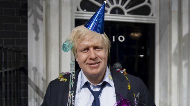FILE - In this photo taken Friday, May 4, 2012 file photo, Madame Tussauds London mark Boris Johnson's victory in the London mayoral election by giving him a post-party makeover. Britain???s new top diplomat is shaggy-haired, Latin-spouting Boris Johnson, who in recent months has made insulting and vulgar comments about the presidents of the United States and Turkey. (AP Photo/Jonathan Short, File)