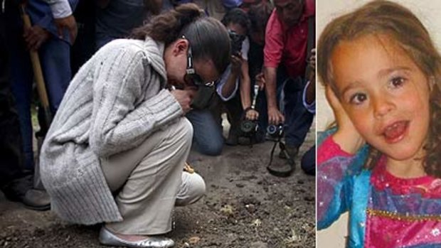 Found dead at home .... Lisette Farah places a flower on the grave of her daughter Paulette Gebara.