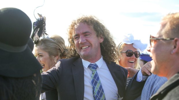 STANDARD, NEWS, MAY RACING CARNIVAL DAY 3, RACE 7 GRAND ANNUAL STEEPLECHASE 170504 Pictured - Trainer Ciaron Maher celebrates after #5 Regina Coeli leads from start to finish to win the Grand Annual.. Picture: Rob Gunstone