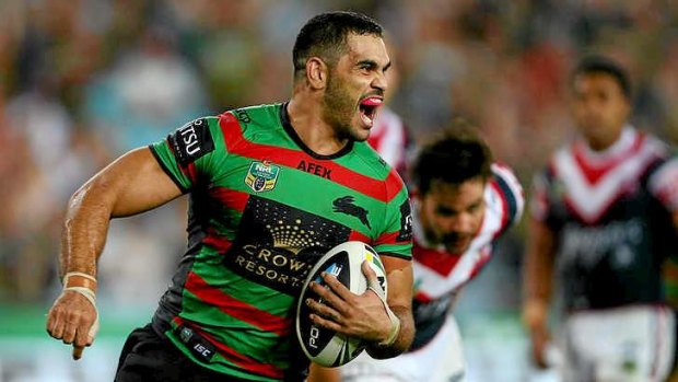 A keeper: Greg Inglis of the Rabbitohs celebrates one of his tries against the Sydney Roosters.