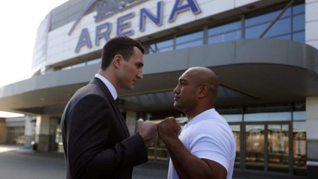 Axel Leapai (right) sizes up Ukrainian heavyweight boxing world champion Wladimir Klitschko.