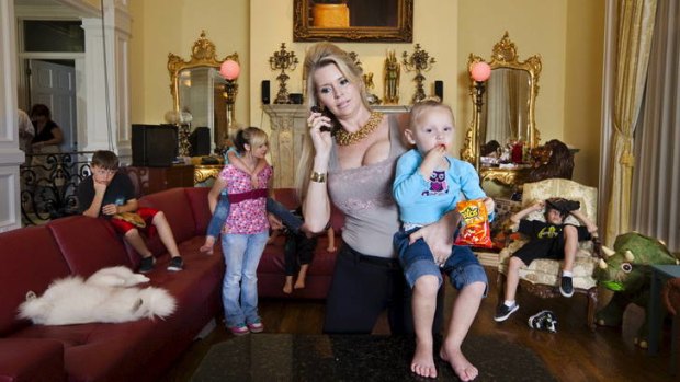 Jackie Siegel, the queen of Versailles, at home with her children.