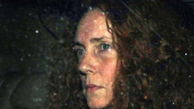 News International chief executive Rebekah Brooks leaves the office of The News of The World on Thursday.