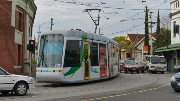 One of the C-class trams passes through an intersection along the 109 route in Kew.