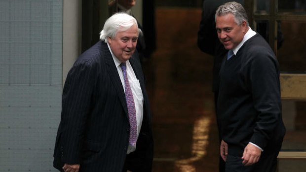 Palmer United Party leader Clive Palmer and Treasurer Joe Hockey. Mr Hockey has threatened to bypass MPs to get contentious budget measures through.