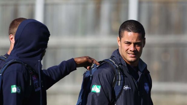 Sharing a reflective moment ... Jarryd hayne (right) and Akuila Uate at Blues training this week.