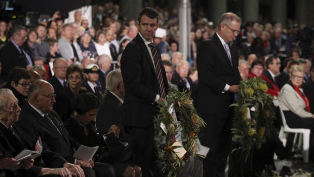 NSW Premier Mike Baird and federal Immigration Minister Scott Morrison prepare to lay wreaths at the Anzac Day Dawn Service in Sydney.