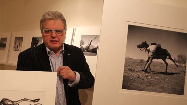 Australian Galleries director Stuart Purves holds a sketch by Sidney Nolan called  Black and White Drought VI 1955. Below, other photos taken by the artist on his outback tour.