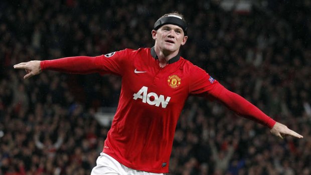 On the double: Manchester United ace Wayne Rooney got his side off to a winning start in the Champions League.