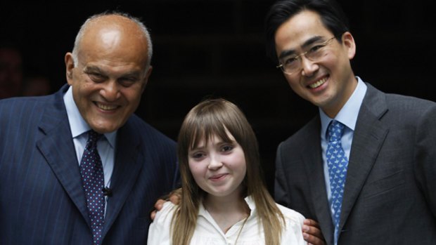 A heart of her own: Hannah Clark with doctors Magdi Yacoub (left)  and Victor Tsang  after a news conference in London  this week.