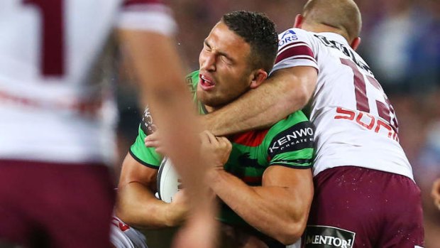 In arm's way: Glenn Stewart was put on report for this tackle on Sam Burgess in the preliminary final on Friday night.