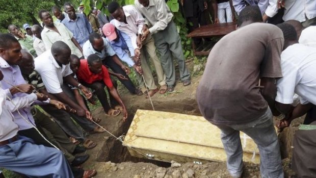 One of the dead is buried after the attack in Mpeketoni.