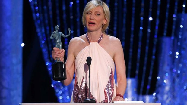 Emotional: Cate Blanchett accepts the award for outstanding performance by a female actor in a leading role  for <i>Blue Jasmine</i> at the 20th annual Screen Actors Guild Awards in Los Angeles.