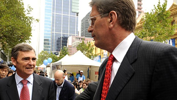 John Brumby (left) and Ted Baillieu in the city yesterday.