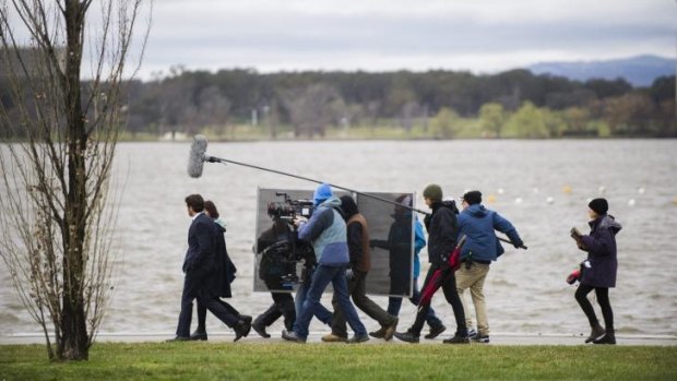 <i>The Code</i> film crew and actors had to battle the weather in Canberra on Monday afternoon.