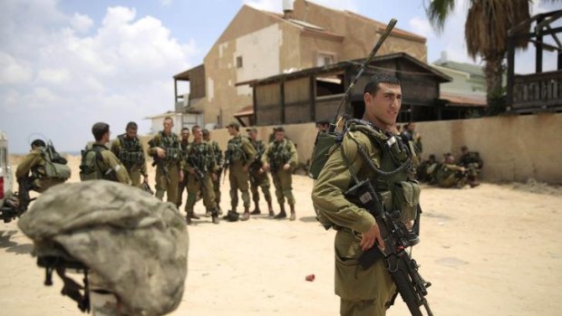 Israeli soldiers patrol the town of Sderot after a group of Hamas militants was detected infiltrating into Israel.