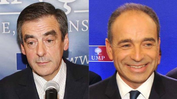 France's former Prime Minister Francois Fillon (left) and the UMP secretary-general Jean Francois Cope (right).
