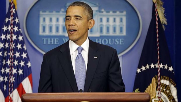 "Congress needs to keep our government open and pay our bills on time": President Barack Obama speaks at the White House in Washington.