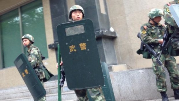 Chinese troop patrols on high alert in Urumqi, the capital of China's autonomous Xinjiang region.