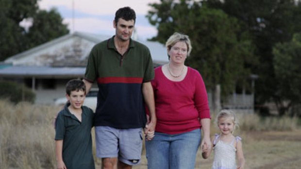 Happily ``unmarried''...the State Government says it has no record that Jodie and Marcus Hucker, pictured with their children Tom and Leila, were ever married.