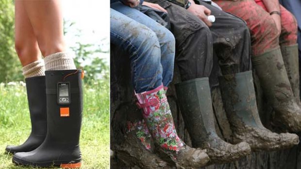 Festival goers rest their feet clad in mud covered Wellington boots at the Glastonbury music festival. Left,  the Orange Power Wellies which festival-goers can wear to keep their mobile phones charged.