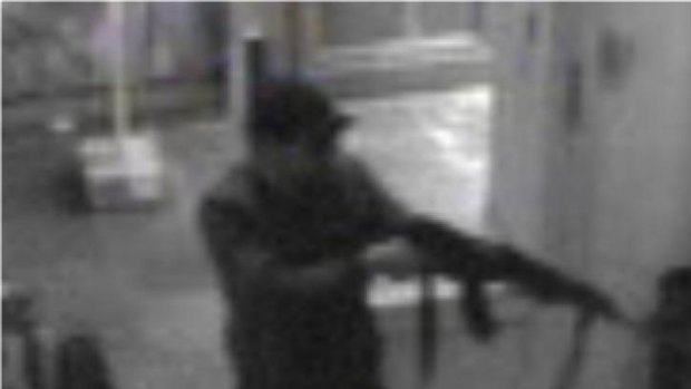 Chilling footage: A surveillance camera shows a man shooting at the Jewish museum in Brussels last month.