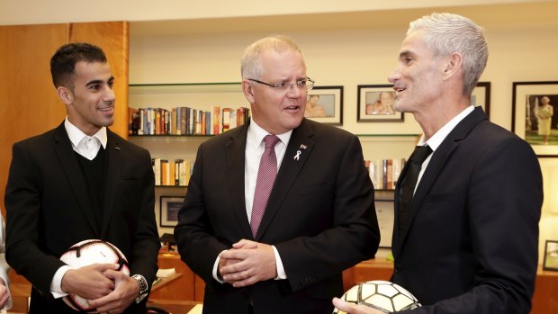 Prime Minister Scott Morrison meets Hakeem al-Araibi and Craig Foster in his office at Parliament House two days after his return. 