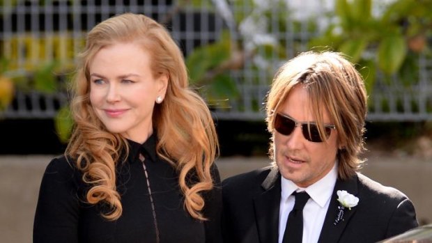 Nicole Kidman and Keith Urban arrive at the funeral service for her father Antony.