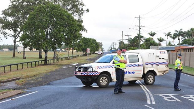 Police at the scene where a body was found in Bundaberg.