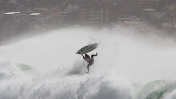 Wipeout ... The waves were more than two metres at Manly.