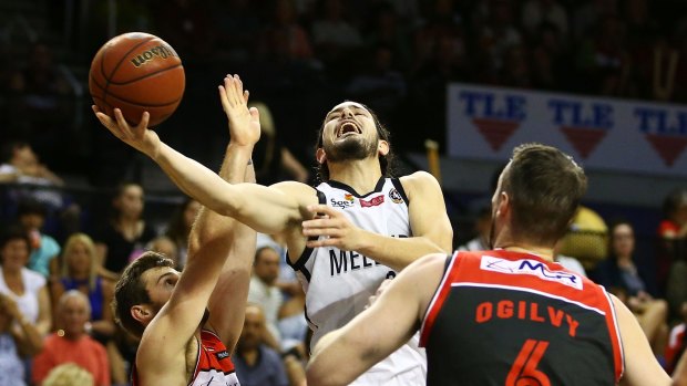 Chris Goulding of Melbourne drives to the basket against the Illawarra Hawks in Wollongong.
