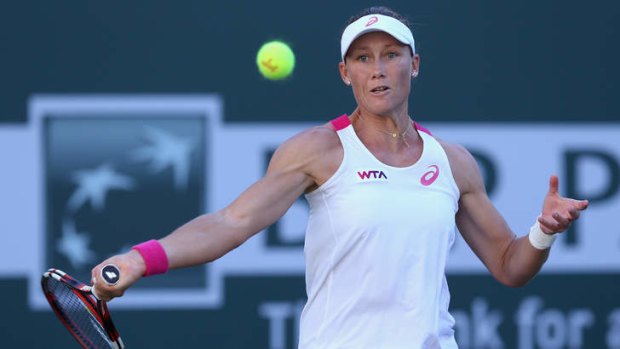 Samantha Stosur in action against Francesca Schiavone.