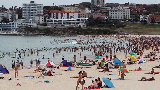 No exception ... Tuesday's heatwave attracted hordes to the beach.