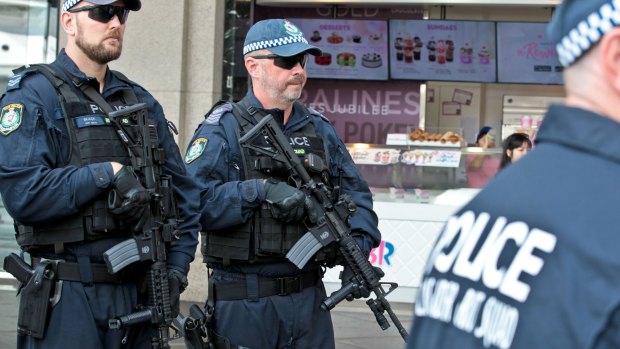 NSW riot squad police officers with the new high-powered assault rifles. 