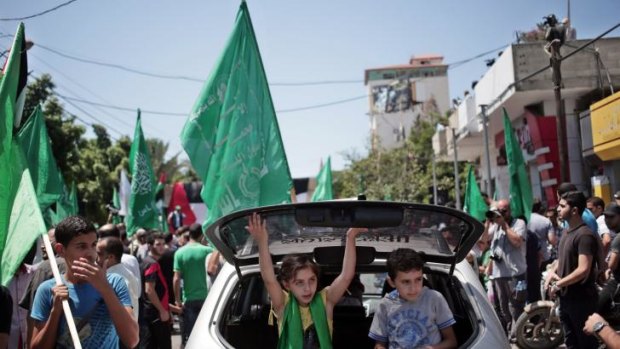 A senior Hamas official told supporters at the rally the war with Israel would not be over until the group's political demands were met. 
