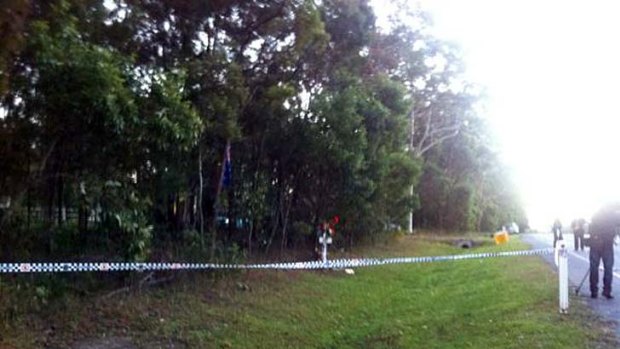 Police have taped off an area further down Chambers Flat Road, where officers found a knife.