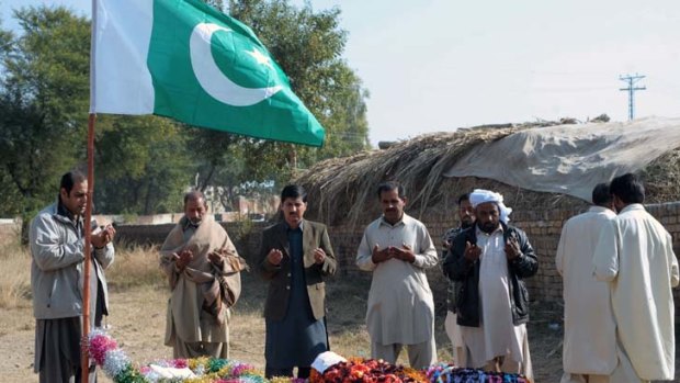 Mourners of the 24 Pakistani soldiers who were killed in an air strike ... NATO and US officials voiced regret but have refused to apologise.
