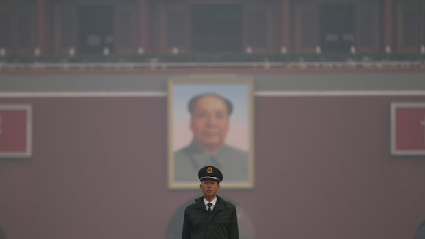 Smog blankets Tiananmen Square in Beijing last year.