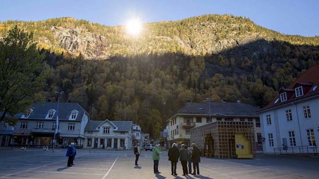 Sunny days: Sunlight is reflected by the giant mirrors onto the town hall in the Norwegian industrial town of Rjukan.