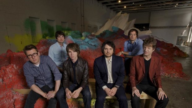 Attuned to each other ... Jeff Tweedy (fourth from left) says the current Wilco line-up is more conversant, passionate and curious.