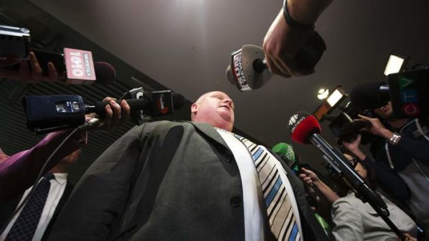 Toronto Mayor Rob Ford makes a statement to the media at City Hall after his press secretary George Christopoulos and deputy press secretary Isaac Ransom resigned in Toronto, May 27, 2013.