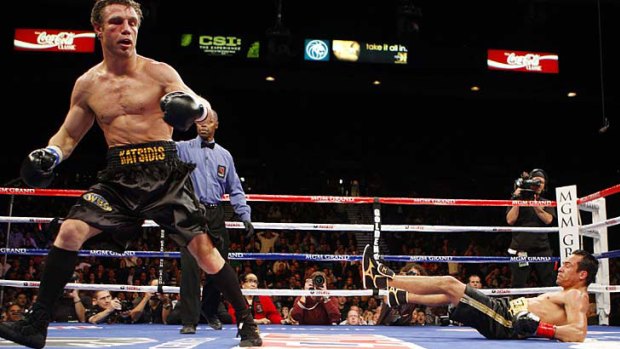 Power puncher ... Michael Katsidis knocks Mexico’s Juan Manuel Marquez to the mat in November 2010.