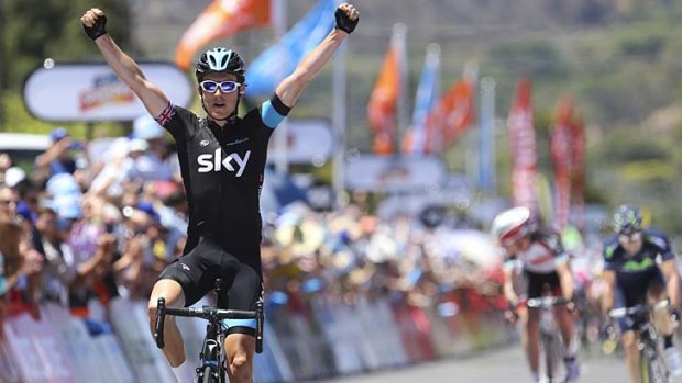 Arms up: Geraint Thomas wins stage two of the Tour Down Under on Wednesday.