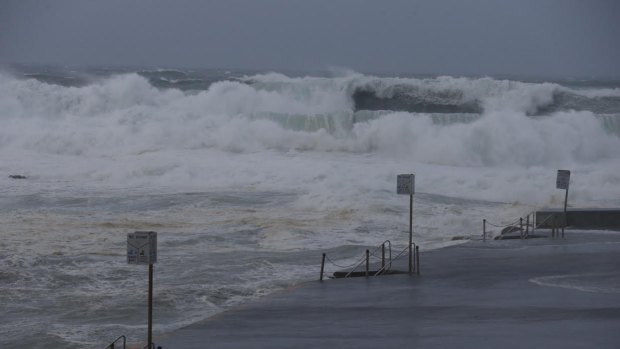 Waves pound the Clovelly Pool on Tuesday morning.